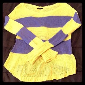 Striped sweater with button detail on back